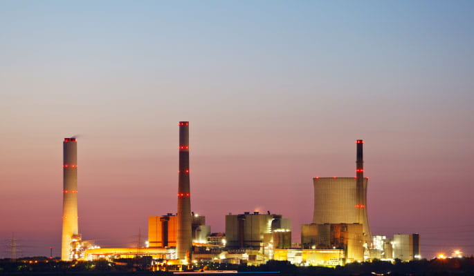 Power generation company at sunset